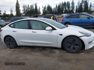 2021 Tesla Model 3 Long Range with VIN 5YJ3E1EB3MF856009, listed as a IAAI auction lot 41809767 with 42,072 mi miles. Bid and sale history available at carsss.com. Image 14.