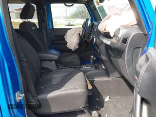2015 Jeep Wrangler Unlimited Altitude с VIN 1C4HJWEG3FL584314, выставлен на аукционе IAAI как лот 41802581 с пробегом 145 143 миль миль и . История ставок и продаж доступна на DreamBid. Изображение 5.