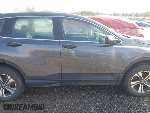 2018 Honda CR-V LX z VIN 2HKRW6H34JH202657, wystawiony jako IAAI lot #41568088 z przebiegiem Nie podano mil oraz . Historia ofert i sprzedaży dostępna na DreamBid. Obrazek 12.