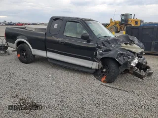 2002 Ford F-150 XL z VIN 1FTRX17W22NB68683, wystawiony jako Copart lot #50702385 z przebiegiem Nie podano mil oraz Szkoda całkowita • Salvage title. Historia ofert i sprzedaży dostępna na DreamBid. Obrazek 4.
