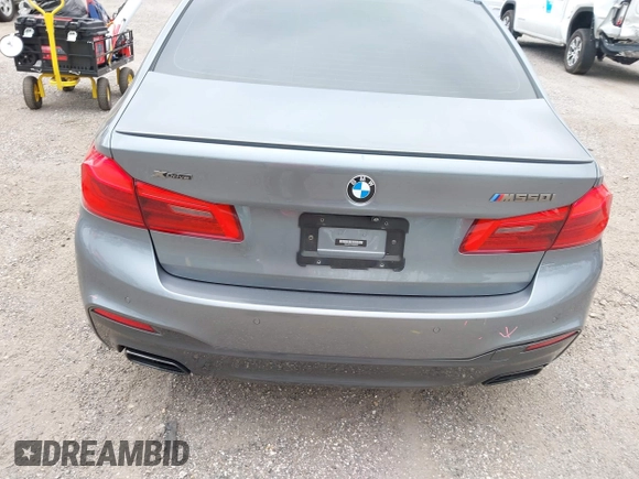 2019 BMW 5 Series M550i xDrive with VIN WBAJB9C57KB289439, listed as a IAAI auction lot 40634389 with 85,992 mi miles and . Bid and sale history available at DreamBid. Image 17.