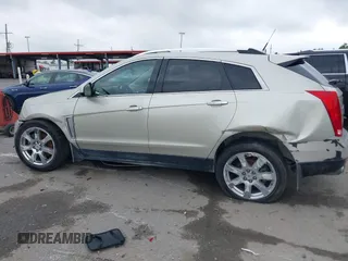 2014 Cadillac SRX Performance Collection z VIN 3GYFNCE35ES610504, wystawiony jako IAAI lot #42133548 z przebiegiem 140 306 mil mil oraz . Historia ofert i sprzedaży dostępna na DreamBid. Obrazek 14.