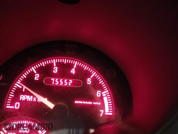 2002 Pontiac Grand Am SE z VIN 1G2NE52F92C291335, wystawiony jako IAAI lot #41665150 z przebiegiem 75 552 mil mil oraz . Historia ofert i sprzedaży dostępna na DreamBid. Obrazek 16.