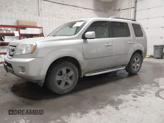 2011 Honda Pilot EX-L with VIN 5FNYF4H66BB029802, listed as a IAAI auction lot 42101545 with 240,127 mi miles and . Bid and sale history available at carsss.com. Image 17.