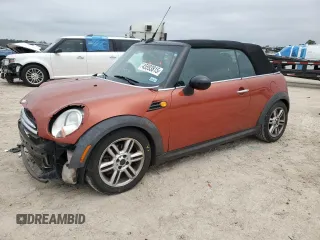 2012 MINI Convertible with VIN WMWZN3C59CT135172, listed as a Copart auction lot 45593815 with 154,477 mi miles and Salvage Title. Bid and sale history available at DreamBid. Image 1.