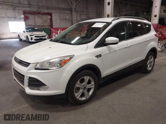 2014 Ford Escape SE with VIN 1FMCU9G90EUD81774, listed as a IAAI auction lot 42067148 with 115,277 mi miles. Bid and sale history available at carsss.com. Image 2.