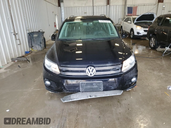 2013 Volkswagen Tiguan S with VIN WVGAV3AX1DW602083, listed as a Copart auction lot 57977515 with 114,375 mi miles and Clean title. Bid and sale history available at DreamBid. Image 5.
