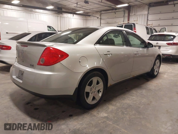 2009 Pontiac G6 w/1SA *Ltd Avail* with VIN 1G2ZG57B094155004, listed as a IAAI auction lot 41925584 with 123,169 mi miles. Bid and sale history available at carsss.com. Image 4.