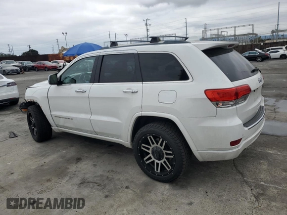 2015 Jeep Grand Cherokee Overland with VIN 1C4RJECG7FC872175, listed as a Copart auction lot 50653205 with 117,433 mi miles and Salvage title. Bid and sale history available at DreamBid. Image 2.