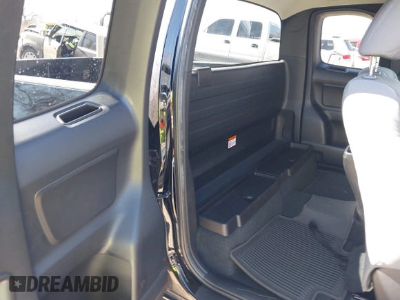 2023 Toyota Tacoma SR with VIN 3TYRX5GN9PT075342, listed as a IAAI auction lot 41652456 with 9,690 mi miles and . Bid and sale history available at DreamBid. Image 8.