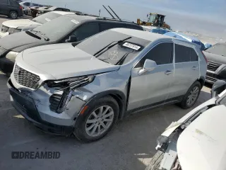 2019 Cadillac XT4 FWD Luxury with VIN 1GYAZAR42KF119510, listed as a Copart auction lot 48979395 with 57,498 mi miles and Salvage Title. Bid and sale history available at carsss.com. Image 1.