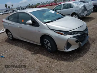 2017 Toyota Prius Plus z VIN JTDKARFP3H3062937, wystawiony jako IAAI lot #42184106 z przebiegiem 67 449 mil mil oraz . Historia ofert i sprzedaży dostępna na DreamBid. Obrazek 1.