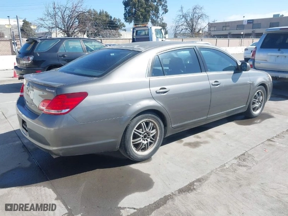2007 Toyota Avalon XL with VIN 4T1BK36B77U197115, listed as a IAAI auction lot 41669729 with 289,786 mi miles. Bid and sale history available at carsss.com. Image 4.