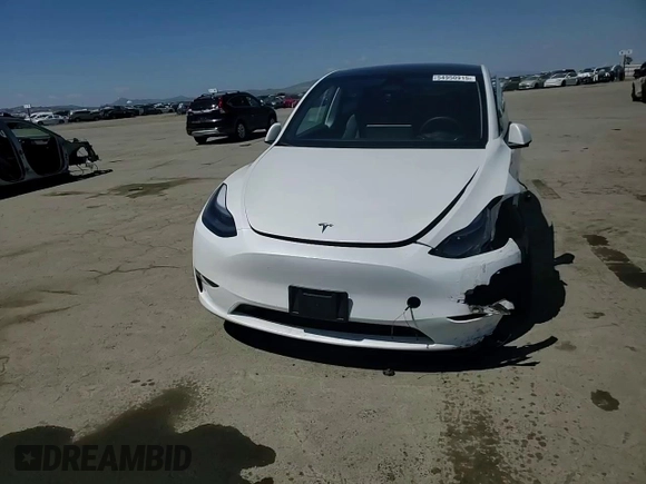 2024 Tesla Model Y Long Range с VIN 7SAYGDEE6RF157415, выставлен на аукционе Copart как лот 54950915 с пробегом 20 567 миль миль и Списание • Salvage title. История ставок и продаж доступна на DreamBid. Изображение 13.