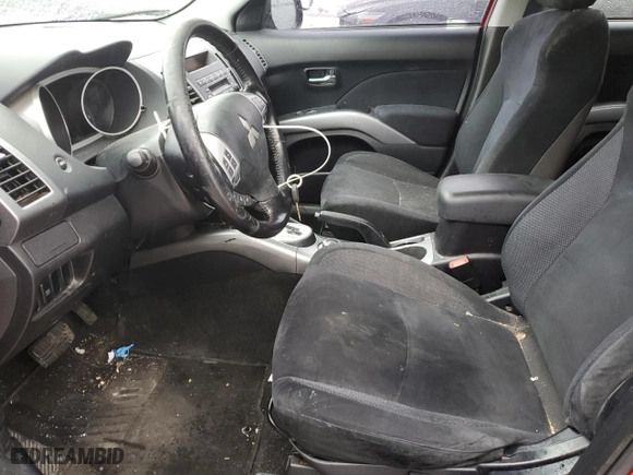 2009 Mitsubishi Outlander ES with VIN JA4LT21WX9Z002120, listed as a Copart auction lot 44244725 with 189,479 mi miles and Salvage Title. Bid and sale history available at carsss.com. Image 7.
