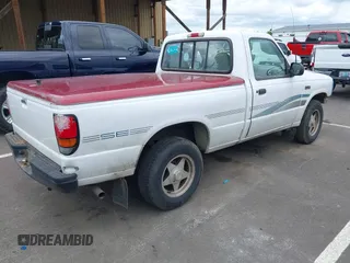 1995 Mazda B-Series Truck z VIN 4F4CR12A9STM30259, wystawiony jako IAAI lot #42243443 z przebiegiem 211 203 mil mil oraz . Historia ofert i sprzedaży dostępna na DreamBid. Obrazek 4.
