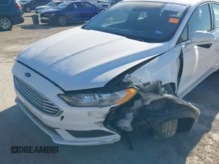 2018 Ford Fusion SE with VIN 3FA6P0H71JR262575, listed as a IAAI auction lot 41408259 with 96,624 mi miles and . Bid and sale history available at DreamBid. Image 6.