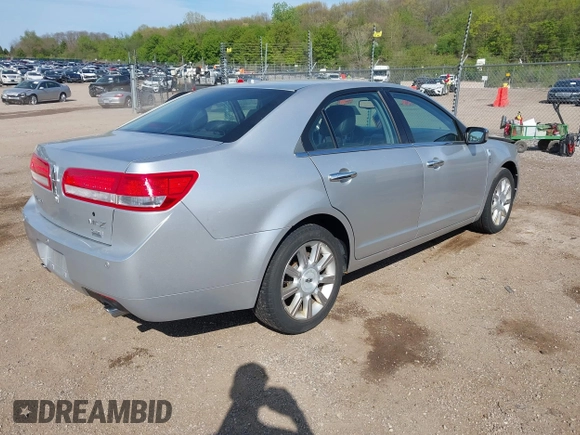 2011 Lincoln MKZ with VIN 3LNHL2GC1BR754870, listed as a IAAI auction lot 42220451 with 143,922 mi miles and . Bid and sale history available at DreamBid. Image 4.