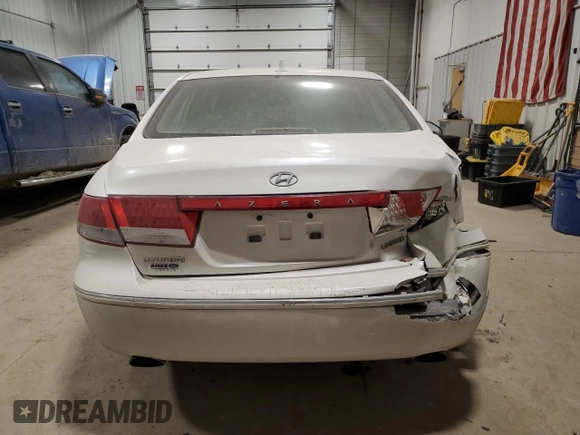 2009 Hyundai Azera Limited z VIN KMHFC46F09A372929, wystawiony jako Copart lot #88455705 z przebiegiem 111 222 mil mil oraz Szkoda całkowita • Salvage title. Historia ofert i sprzedaży dostępna na DreamBid. Obrazek 6.