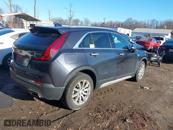 2022 Cadillac XT4 AWD Premium Luxury with VIN 1GYFZDR40NF139931, listed as a IAAI auction lot 41168482 with 28,748 mi miles and . Bid and sale history available at carsss.com. Image 4.