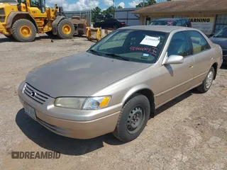 1997 Toyota Camry LE with VIN JT2BG22K4V0084080, listed as a IAAI auction lot 42566043 with 167,774 mi miles and . Bid and sale history available at DreamBid. Image 2.