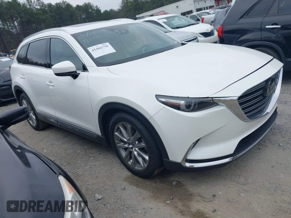 2016 Mazda CX-9 Grand Touring with VIN JM3TCADY0G0113779, listed as a IAAI auction lot 41466750 with 58,035 mi miles and . Bid and sale history available at DreamBid. Image 1.