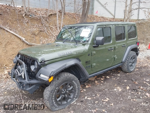 2021 Jeep Wrangler Unlimited Willys with VIN 1C4HJXDNXMW579595, listed as a IAAI auction lot 41930989 with 32,148 mi miles and . Bid and sale history available at DreamBid. Image 18.
