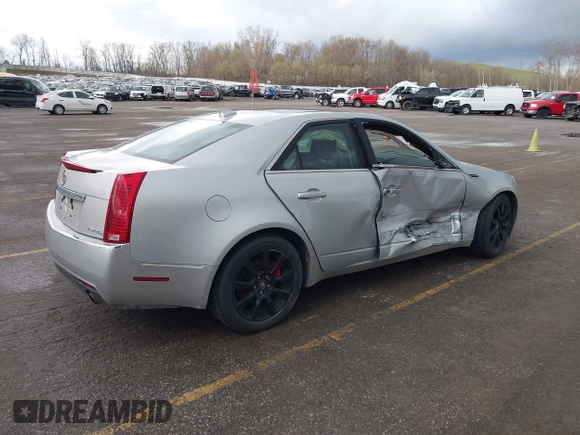 2009 Cadillac CTS AWD z VIN 1G6DH577X90135559, wystawiony jako IAAI lot #42077850 z przebiegiem 175 345 mil mil oraz . Historia ofert i sprzedaży dostępna na DreamBid. Obrazek 4.
