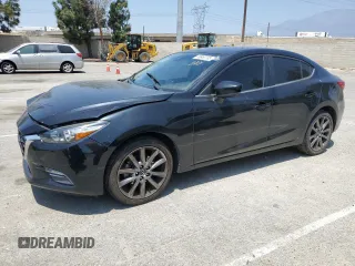 2018 Mazda 3 Touring z VIN 3MZBN1V34JM242790, wystawiony jako Copart lot #58860795 z przebiegiem 106 061 mil mil oraz Szkoda całkowita • Salvage title. Historia ofert i sprzedaży dostępna na DreamBid. Obrazek 1.
