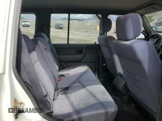 1999 Isuzu Trooper S z VIN JACDJ58XXX7922000, wystawiony jako Copart lot #48209835 z przebiegiem 127 024 mil mil oraz Szkoda całkowita • Salvage title. Historia ofert i sprzedaży dostępna na DreamBid. Obrazek 11.