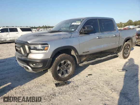 2020 Ram 1500 Rebel with VIN 1C6RRELT7LN299176, listed as a Copart auction lot 76778334 with 70,059 mi miles and Salvage title. Bid and sale history available at DreamBid. Image 1.