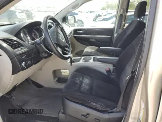 2014 Dodge Grand Caravan SXT z VIN 2C4RDGCG8ER266814, wystawiony jako Copart lot #52053155 z przebiegiem 279 551 mil mil oraz Tytuł czysty. Historia ofert i sprzedaży dostępna na DreamBid. Obrazek 7.