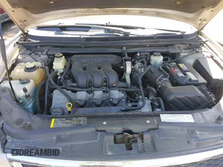 2006 Ford Five Hundred SEL with VIN 1FAFP24126G117587, listed as a IAAI auction lot 42058825 with 183,380 mi miles. Bid and sale history available at carsss.com. Image 10.