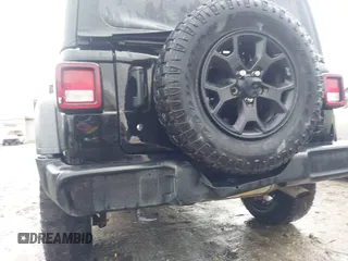 2021 Jeep Wrangler Unlimited Sport S with VIN 1C4HJXDN0MW678801, listed as a IAAI auction lot 42211815 with 96,849 mi miles and . Bid and sale history available at DreamBid. Image 6.