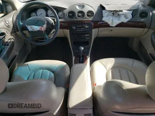 2001 Chrysler LHS z VIN 2C3HC56G11H643759, wystawiony jako Copart lot #70924974 z przebiegiem 124 263 mil mil oraz Tytuł czysty. Historia ofert i sprzedaży dostępna na DreamBid. Obrazek 8.
