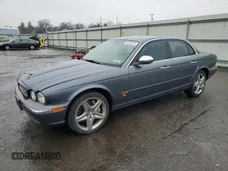 2004 Jaguar XJ R z VIN SAJWA73B94TG17256, wystawiony jako Copart lot #50262285 z przebiegiem 134 512 mil mil oraz Szkoda całkowita • Salvage title. Historia ofert i sprzedaży dostępna na DreamBid. Obrazek 1.