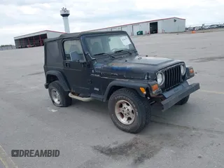 1997 Jeep Wrangler SE z VIN 1J4FY29P9VP488503, wystawiony jako IAAI lot #42363173 z przebiegiem 191 266 mil mil oraz . Historia ofert i sprzedaży dostępna na DreamBid. Obrazek 1.