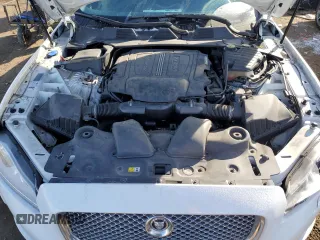 2013 Jaguar XJ z VIN SAJWJ1CD0D8V53753, wystawiony jako Copart lot #45155755 z przebiegiem 53 524 mil mil oraz Szkoda całkowita • Salvage title. Historia ofert i sprzedaży dostępna na DreamBid. Obrazek 11.