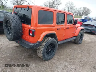 2020 Jeep Wrangler Unlimited Sahara with VIN 1C4HJXENXLW231194, listed as a IAAI auction lot 42083147 with 34,166 mi miles. Bid and sale history available at carsss.com. Image 4.