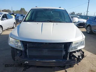 2012 Dodge Journey SXT z VIN 3C4PDCBG7CT374496, wystawiony jako IAAI lot #42317000 z przebiegiem 149 029 mil mil oraz . Historia ofert i sprzedaży dostępna na DreamBid. Obrazek 6.