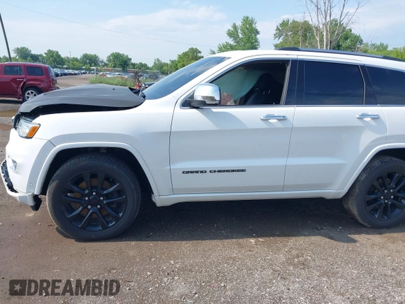 2017 Jeep Grand Cherokee Overland with VIN 1C4RJFCT6HC880306, listed as a IAAI auction lot 42534987 with 97,976 mi miles and . Bid and sale history available at DreamBid. Image 14.