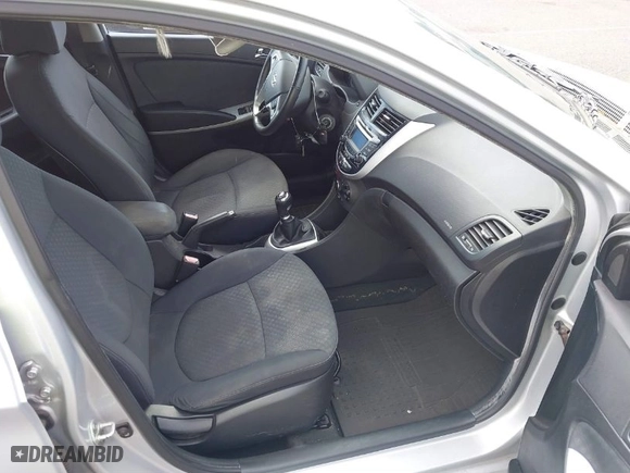 2012 Hyundai Accent SE with VIN KMHCU5AE7CU030632, listed as a IAAI auction lot 41290434 with 98,182 mi miles. Bid and sale history available at carsss.com. Image 5.
