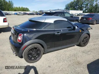 2015 MINI Cooper Coupe with VIN WMWSX1C52FT508184, listed as a Copart auction lot 60639664 with 95,502 mi miles and Salvage Title. Bid and sale history available at carsss.com. Image 3.