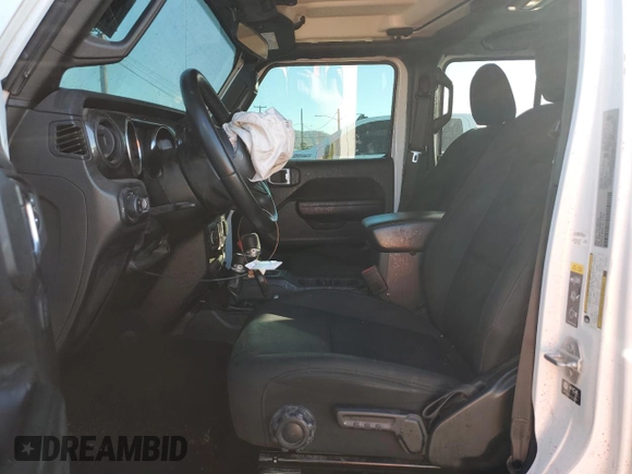 2022 Jeep Gladiator Willys with VIN 1C6HJTAG9NL143314, listed as a Copart auction lot 87974155 with 25,106 mi miles and Salvage title. Bid and sale history available at DreamBid. Image 7.