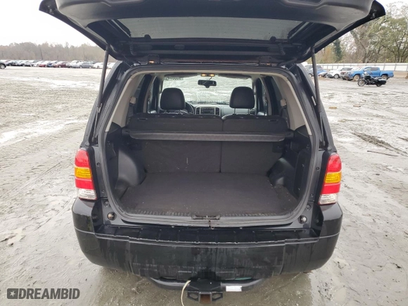 2007 Ford Escape Limited with VIN 1FMYU04117KA50409, listed as a Copart auction lot 87290864 with 239,877 mi miles and Salvage Title. Bid and sale history available at carsss.com. Image 6.