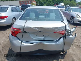 2018 Toyota Corolla L with VIN 2T1BURHE8JC116054, listed as a IAAI auction lot 42450016 with 65,342 mi miles and . Bid and sale history available at DreamBid. Image 16.