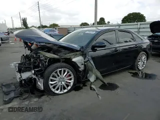 2014 Audi A6 Premium Plus z VIN WAUFGAFC6EN105727, wystawiony jako Copart lot #47950335 z przebiegiem 76 392 mil mil oraz Szkoda całkowita • Salvage title. Historia ofert i sprzedaży dostępna na DreamBid. Obrazek 11.