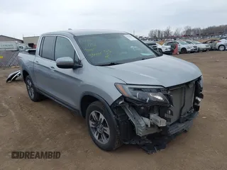 2018 Honda Ridgeline RTL with VIN 5FPYK3F54JB015404, listed as a IAAI auction lot 41900025 with 49,421 mi miles and . Bid and sale history available at DreamBid. Image 1.