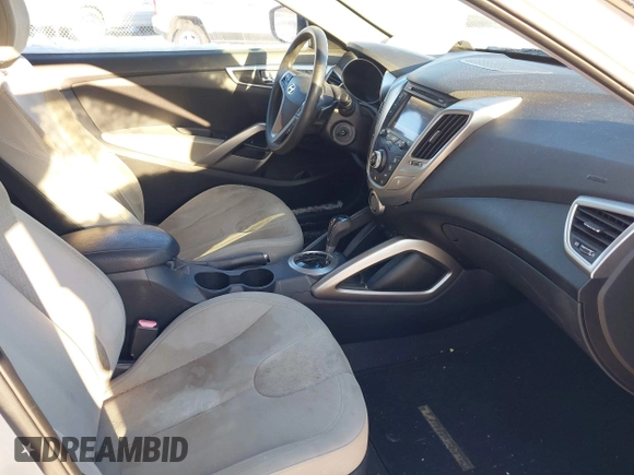2012 Hyundai Veloster w/Gray Int with VIN KMHTC6AD0CU034568, listed as a IAAI auction lot 41460659 with 141,826 mi miles and . Bid and sale history available at DreamBid. Image 5.