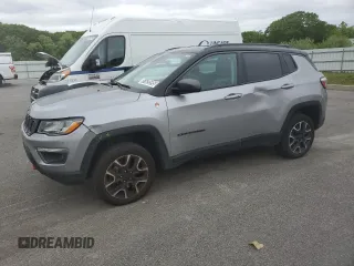 2021 Jeep Compass Trailhawk with VIN 3C4NJDDBXMT565063, listed as a Copart auction lot 57620595 with 125,956 mi miles and Clean title. Bid and sale history available at DreamBid. Image 1.